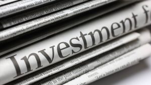 Wirtschaftszeitungen mit Investment